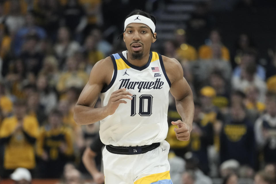 Marquette's Zach Wrightsil runs during the first half of an NCAA college basketball game against Radford Monday, Nov. 7, 2022, in Milwaukee. They already overcame the ravages of a hurricane to win a national title at their old school. Now former Loyola-New Orleans teammates Zach Wrightsil, Myles Burns and Brandon Davis are aiming for one more improbable achievement as they attempt to make the leap from their NAIA program and succeed at the NCAA Division I level. (AP Photo/Morry Gash)