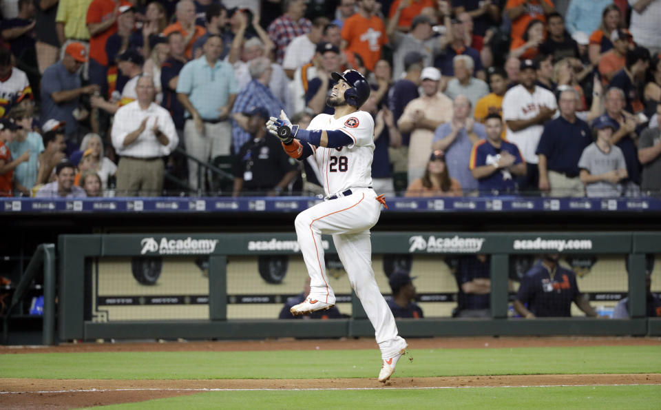 Houston Astros' Robinson Chirinos celebrates after hitting a home run against the Detroit Tigers during the seventh inning of a baseball game Wednesday, Aug. 21, 2019, in Houston. (AP Photo/David J. Phillip)