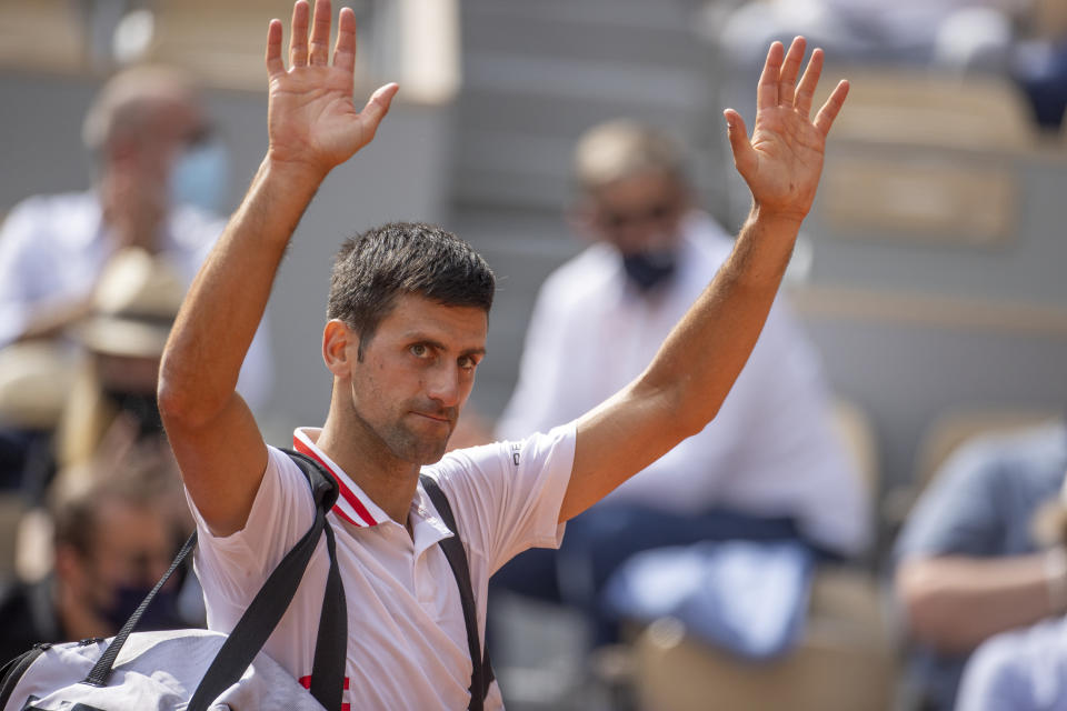 Novak Djokovic of Serbia celebrates his victory against Lorenzo Musetti of Italy.