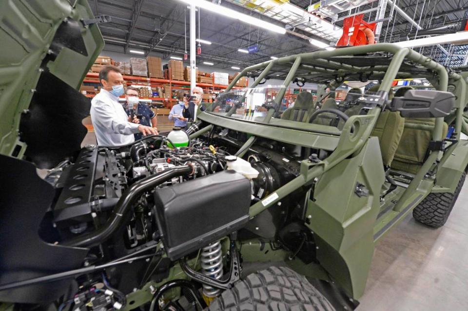 Ronald Kennedy, Quality Manager, GM Defense Concord Facility describes the production process on the assembly line of the new Infantry Squad Vehicle built for the U.S. Army at the GM Defense facility in Concord, NC, during a tour on Tuesday, May 4, 2021. The vehicle is an air-transportable high-speed, light utility vehicle based on the Chevrolet Colorado ZR2 platform.