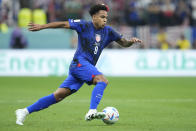 Weston McKennie of the United States controls the ball during the World Cup group B soccer match between England and The United States, at the Al Bayt Stadium in Al Khor , Qatar, Friday, Nov. 25, 2022. (AP Photo/Ashley Landis)