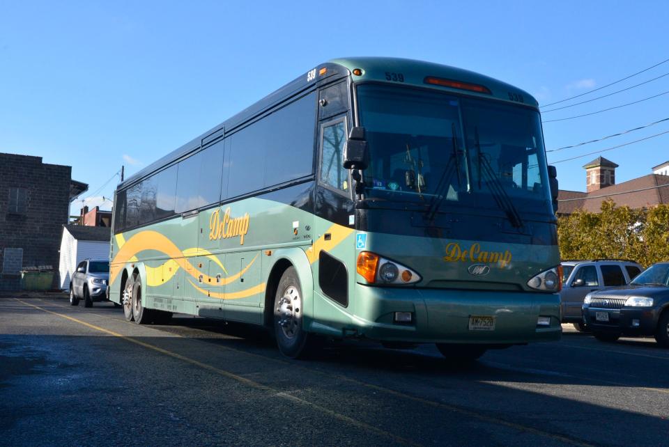 03/04/16: DeCamp Bus Lines coach, 1 of 80, according to their website, parked in the lot opposite the HQ offices and garage on Friday afternoon as talks continue in Washington, D.C.