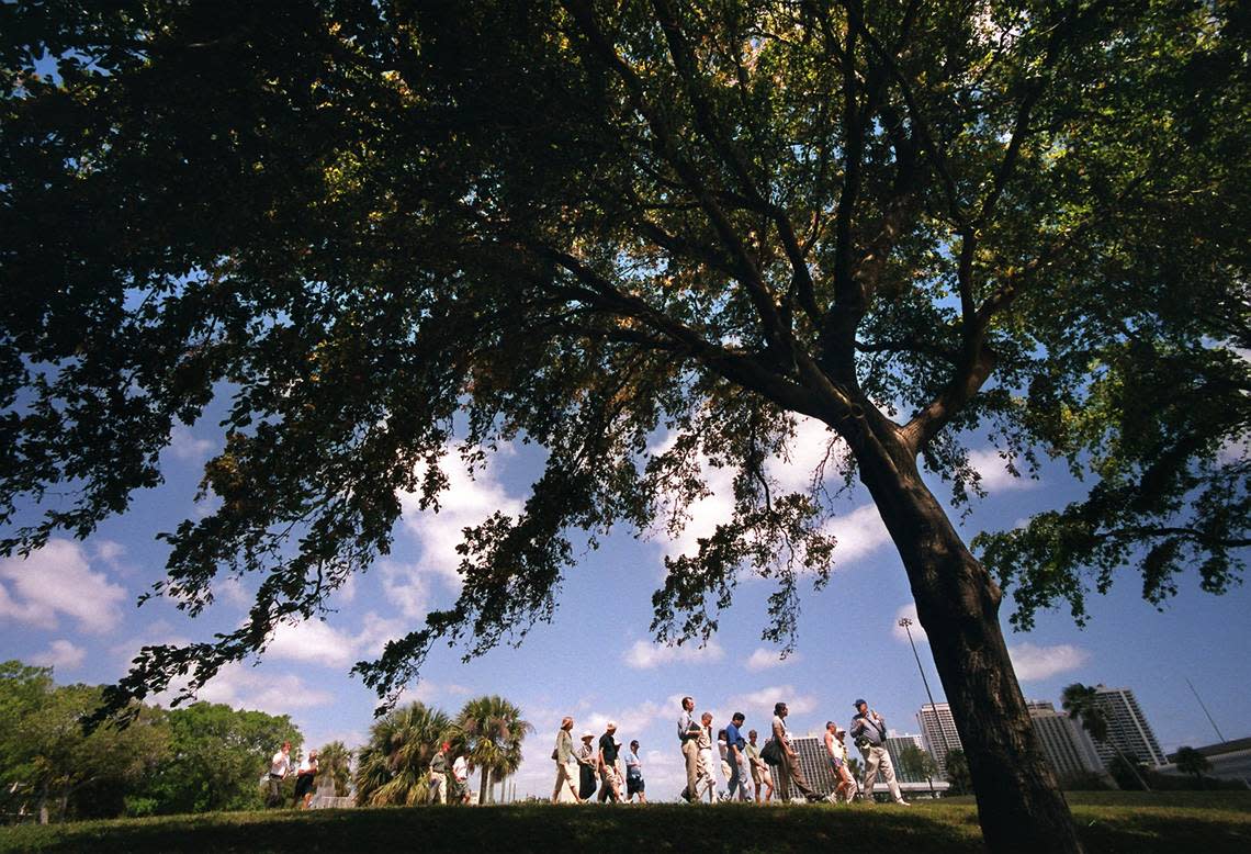 A group against building a Marlins stadium in the park gathers in Bicentennial Park for a tour in 2000.