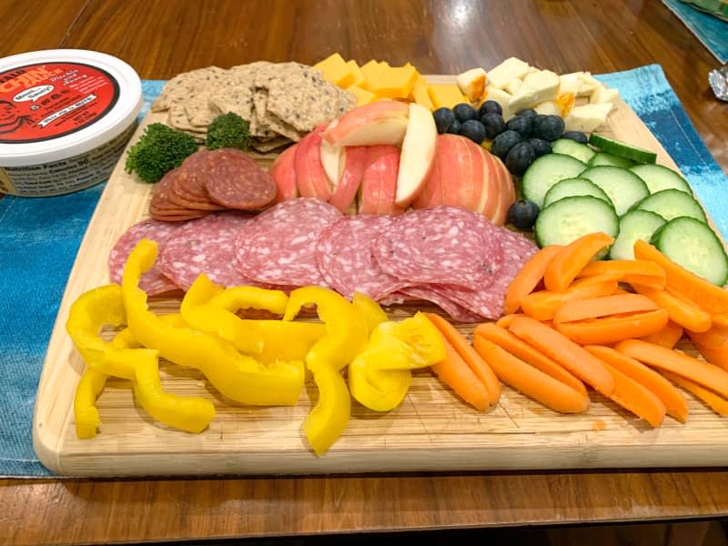 Monday: "Snack Plate Dinner" bell peppers, carrots, broccoli, cucumbers, blueberries, apples, salami, pepperoni, sliced cheddar, and Port Salut cheeses with Bitchin’ Sauce, ranch sour cream, tzatziki dip, Wheat Thins, and Crunchmasters multi-grain crackers