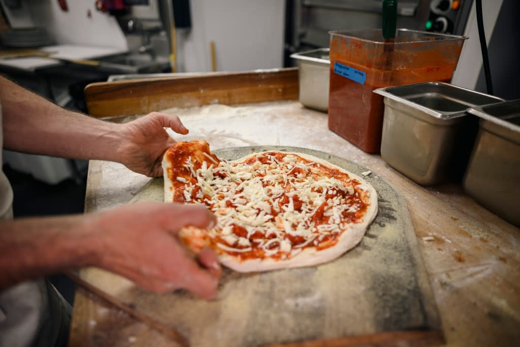 Leonti handmakes a margherita pizza on Monday, April 29. Stefano Giovannini for N.Y.Post