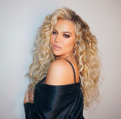 <p>On the other side of the world, pregnant Khloe Kardashian told her fans this was her "Final glam of 2017!"</p>