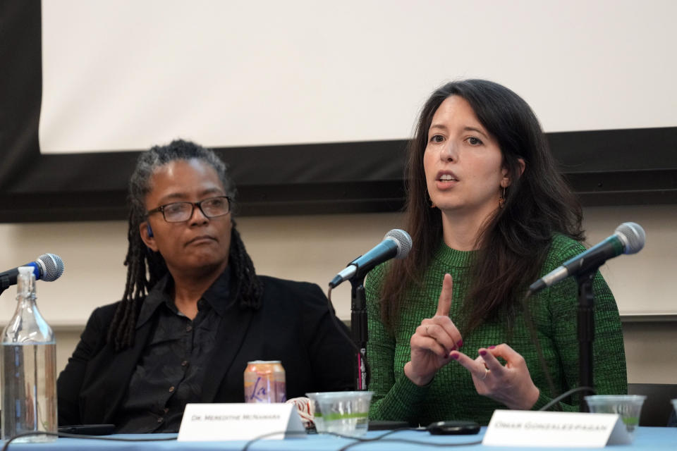 Dr. Meredithe McNamara, assistant professor of pediatrics specializing in adolescent medicine at the Yale School of Medicine, addresses a conference: "Contested Truths: LGBTQ Research in the Age of Misinformation," examining the spread of LGBTQ+ misinformation in the media, policymaking, and academia, at the Williams Institute at the UCLA School of Law in Los Angeles campus Friday, April 14, 2023. At left, Nadine Smith, LGBT activist and executive director of Equality Florida. (AP Photo/Damian Dovarganes)