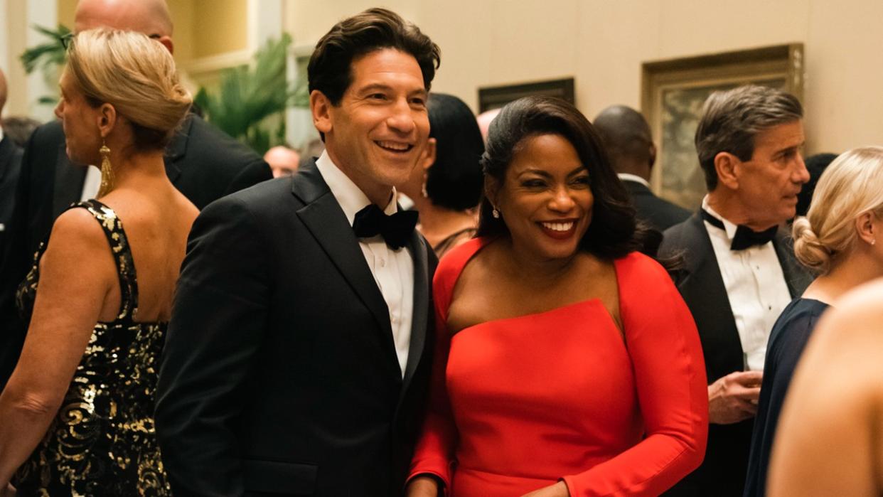  Non Bernthal and Aunjanue Ellis-Taylor in a press photo of Origin looking happy at a fancy event. 