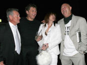 Australian rock singer Chrissy Amphlett (middle right) with former Divinyls band members Matthew Kelly (left), Rick Grossman and Vince Lovegrove (far right) in 2005.