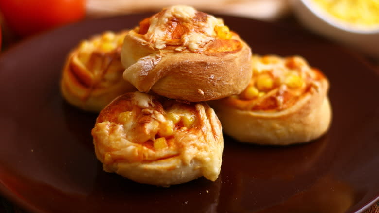 Pizza pinwheels on plate