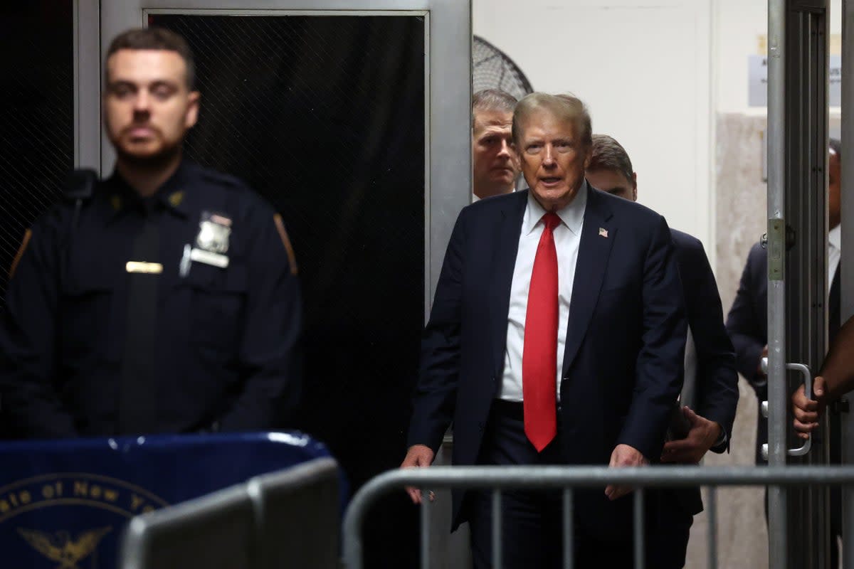 Donald Trump walks into his hush money trial on 28 May. The federal judge in his classified documents case denied a request by Special Counsel Jack Smith to place a gag order on the former president (Getty Images)