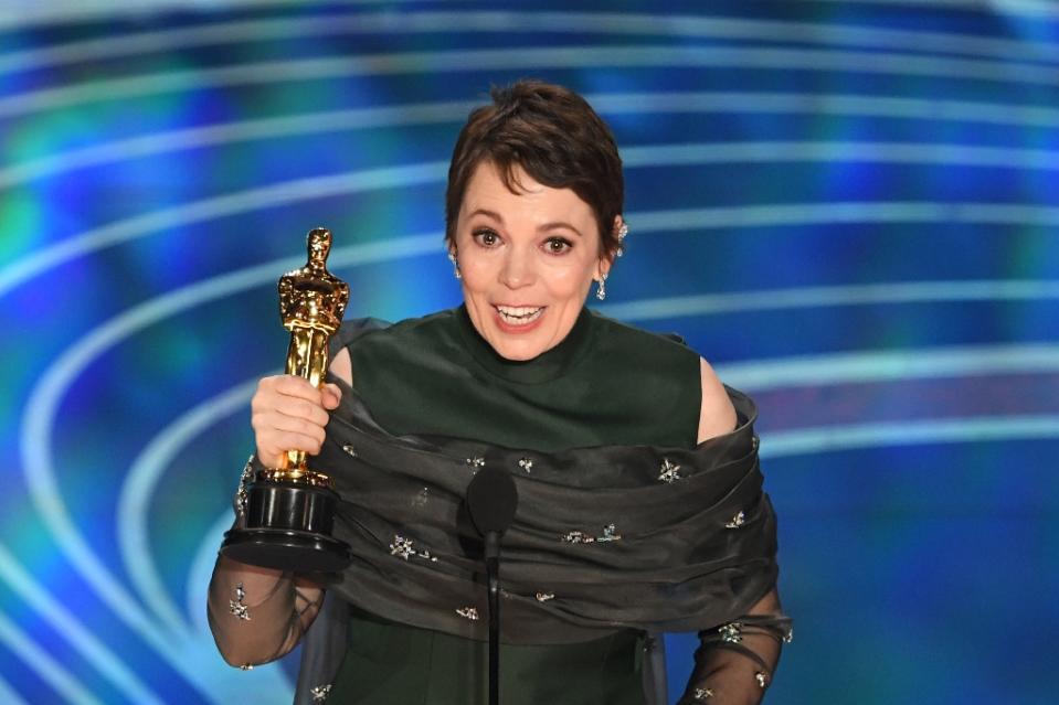 Olivia Colman pulled one of the biggest surprises of the night, winning the best actress Oscar for “The Favourite” (AFP Photo/VALERIE MACON)