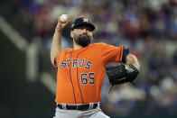 Houston Astros starting pitcher Jose Urquidy throws during the first inning in Game 4 of the baseball American League Championship Series against the Texas Rangers Thursday, Oct. 19, 2023, in Arlington, Texas. (AP Photo/Julio Cortez)
