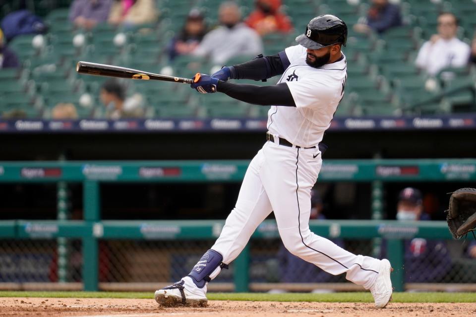 Detroit Tigers' Nomar Mazara hits a triple against the Minnesota Twins in the fourth inning of a baseball game in Detroit, Saturday, May 8, 2021.