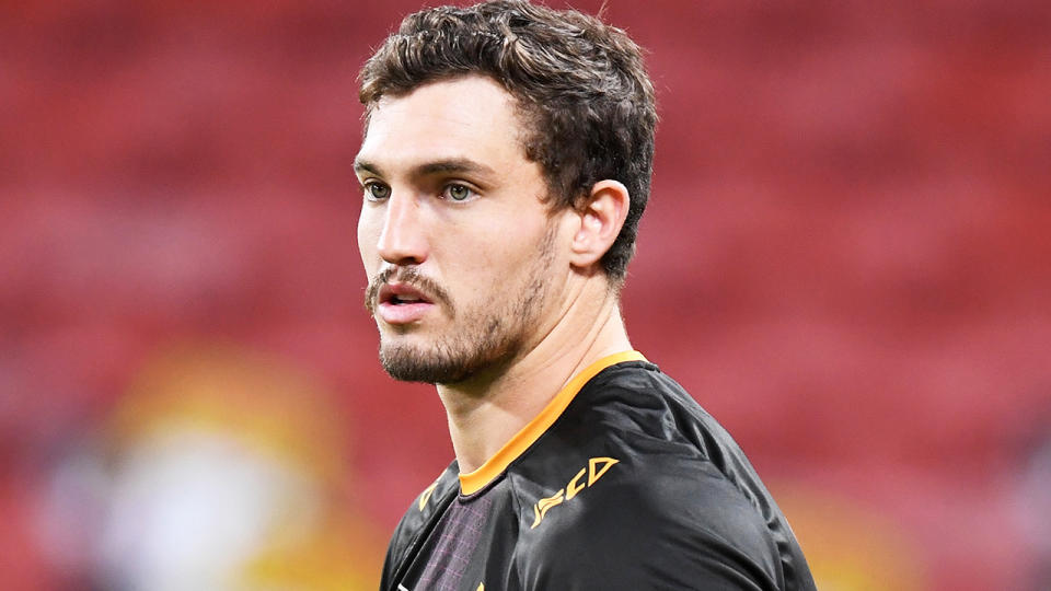 Corey Oates is pictured warming up for the Brisbane Broncos.