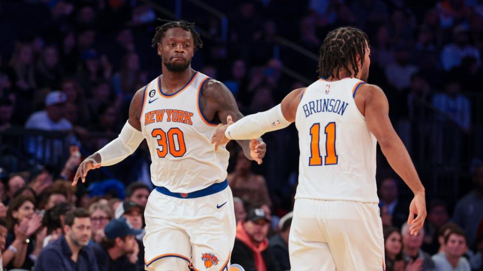 Oct 24, 2022; New York, New York, USA; New York Knicks forward Julius Randle (30) slaps hands with guard Jalen Brunson (11) after making a three point basket against the Orlando Magic during the first half at Madison Square Garden. Mandatory Credit: Vincent Carchietta-USA TODAY Sports