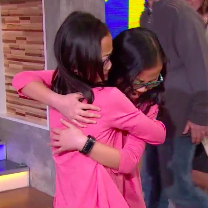 Watch identical twin girls meet for the first time after being adopted to different families, and yes, you will cry