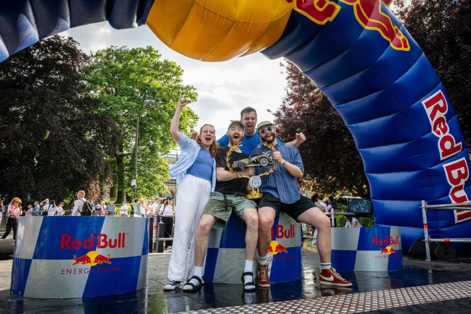 The Hurry Houdinis pose for a portrait after winning the Red Bull Soapbox Race (Red Bull)