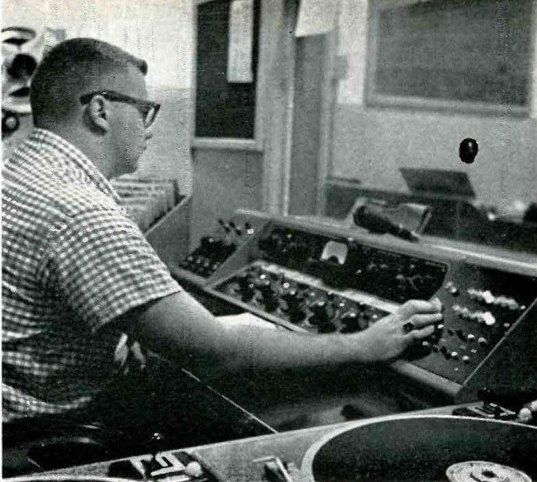 An early 1960s photo of Ken Orchard as he operates a radio console at KHJ-AM in Los Angeles.