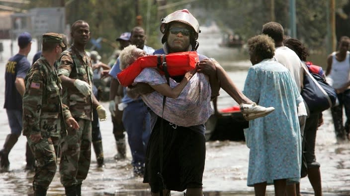 A woman is carried out of floodwaters in 2005 after being trapped in her home in New Orleans in the aftermath of Hurricane Katrina. The head of the Federal Emergency Management Agency said recently that many lessons were learned from the government’s heavily criticized response to that disaster. (Photo: Mario Tama/Getty Images)