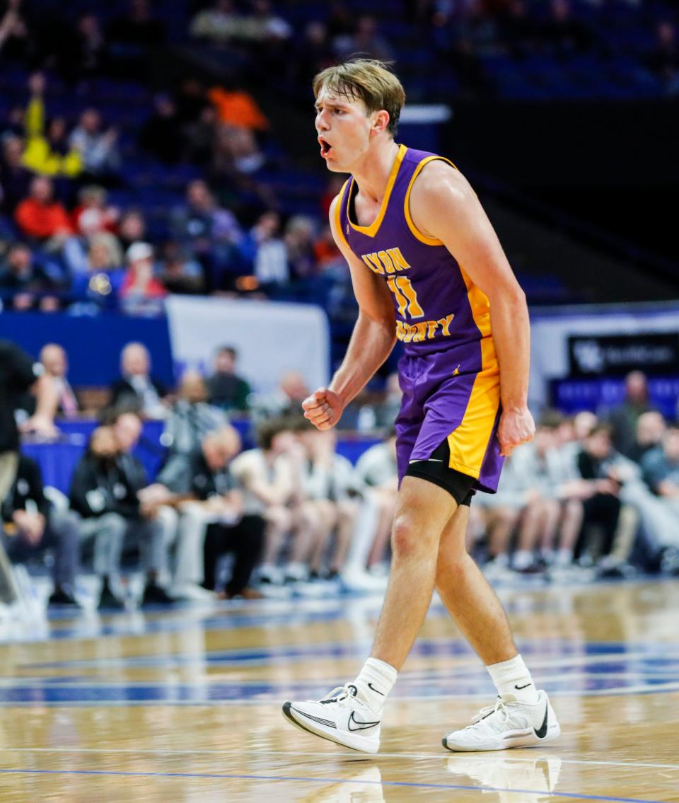 Lyon County's Travis Perry (11) reacts after hitting a clutch three-point shot against Ashland Blazer in the second half at the first round of the 2024 UK Healthcare KHSAA Boys' Sweet 16 in Lexington. The UK signee finished with 16 points and five rebounds with five assists in the Lions' 45-43 win Thursday. March 20, 2024