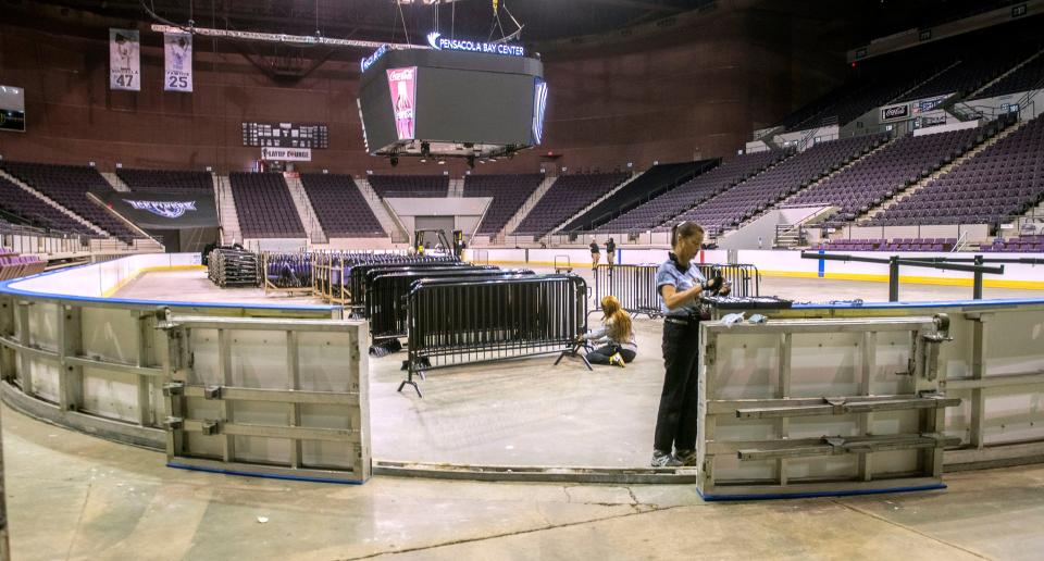 Workers prepare the Pensacola Bay Center arena for the upcoming hockey season during a training session on Thursday, Aug. 17, 2023. The Bay Center has renovated many facilities to enhance the user experience and expects to make more in the coming months.