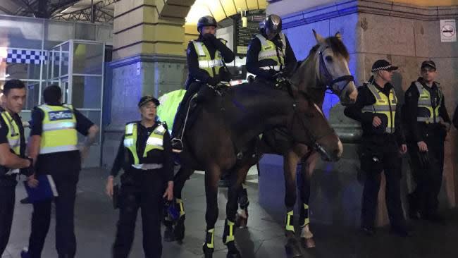 Mounted police attempt to bring order to the CBD crowd. Picture: Twitter