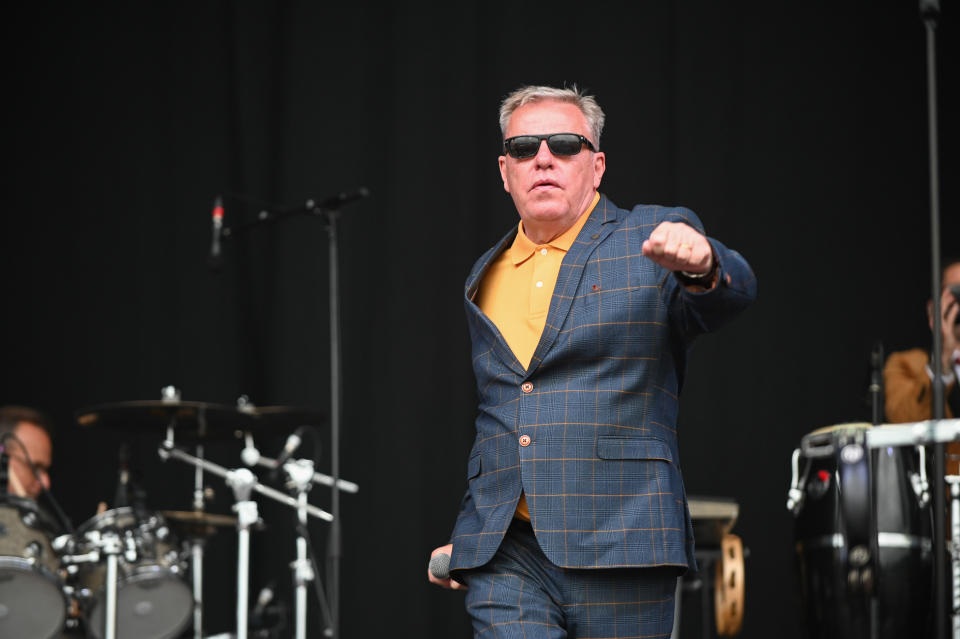 SHEFFIELD, SOUTH YORKSHIRE, UNITED KINGDOM - 2022/07/24: Lead Singer, Graham McPherson, known by his stage name Suggs, performs all the Hits with his Band Madness at Tramlines Festival in Sheffield. (Photo by Robin Burns/SOPA Images/LightRocket via Getty Images)