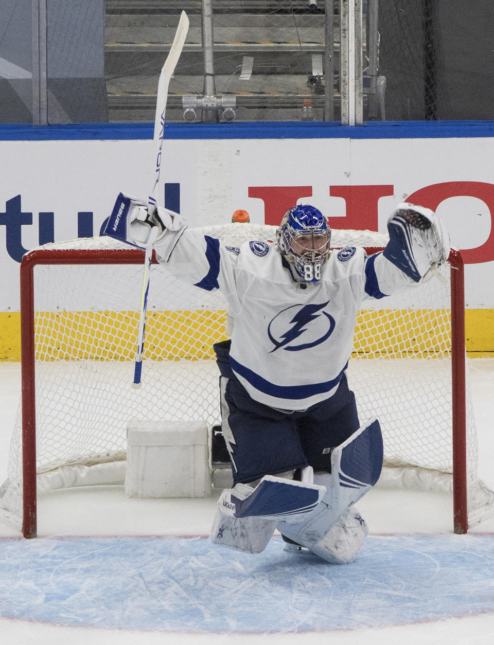 Tampa Bay Lightning goaltender Andrei Vasilevskiy celebrates the team's overtime win over the New York Islanders in Game 6 of the NHL hockey Eastern Conference final, Thursday, Sept. 17, 2020, in Edmonton, Alberta. (Jason Franson/The Canadian Press via AP)