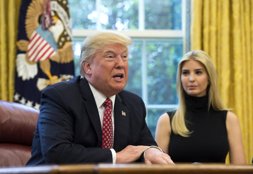 WASHINGTON, DC - APRIL 24:  (AFP OUT) U.S. President Donald Trump speaks along with his daughter Ivanka Trump (R) and NASA Astronaut Kate Rubins (not seen), during a video conference with NASA astronauts aboard the International Space Station in the Oval Office at the White House April 24, 2017 in Washington, DC. (Photo by Molly Riley-Pool/Getty Images)