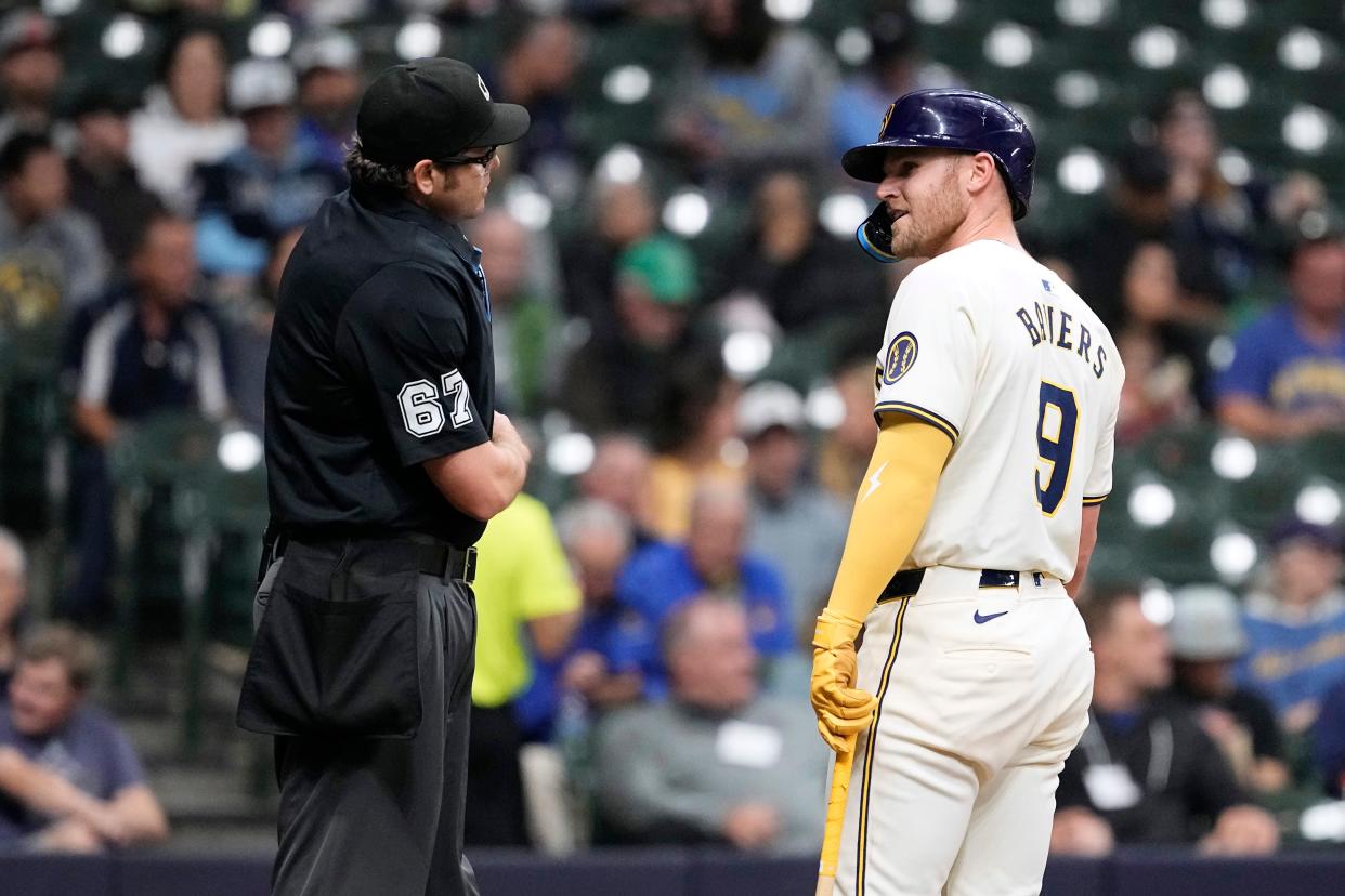 Brewers first baseman Jake Bauers argues with home plate umpire Ryan Addison after being called out on strikes during the fourth inning against the Tampa Bay Rays at American Family Field.