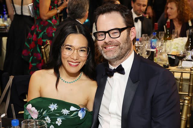 <p>Kevin Mazur/Getty </p> Bill Hader and Ali Wong at the Critics Choice Awards