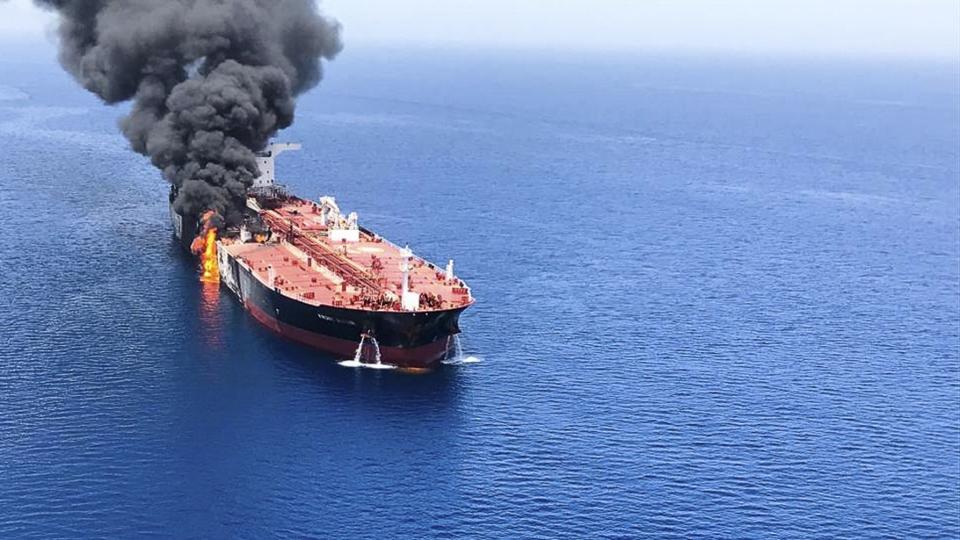 An oil tanker is on fire in the sea of Oman, Thursday, June 13, 2019. Two oil tankers near the strategic Strait of Hormuz were reportedly attacked on Thursday, an assault that left one ablaze and adrift as sailors were evacuated from both vessels and the U.S. Navy rushed to assist amid heightened tensions between Washington and Tehran. (AP Photo/ISNA)