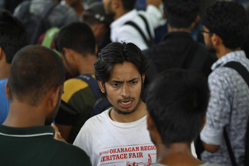 National Institute of Technology (NIT) students who left Srinagar, Kashmir's main city wait to leave for their respective homes at the railway station in Jammu, India, Sunday, Aug. 4, 2019. Thousands of Indian students and visitors were fleeing Indian-controlled Kashmir over the weekend after the government ordered tourists and Hindu pilgrims visiting a Himalayan cave shrine "to curtail their stay" in the disputed territory, citing security concerns. (AP Photo/Channi Anand)