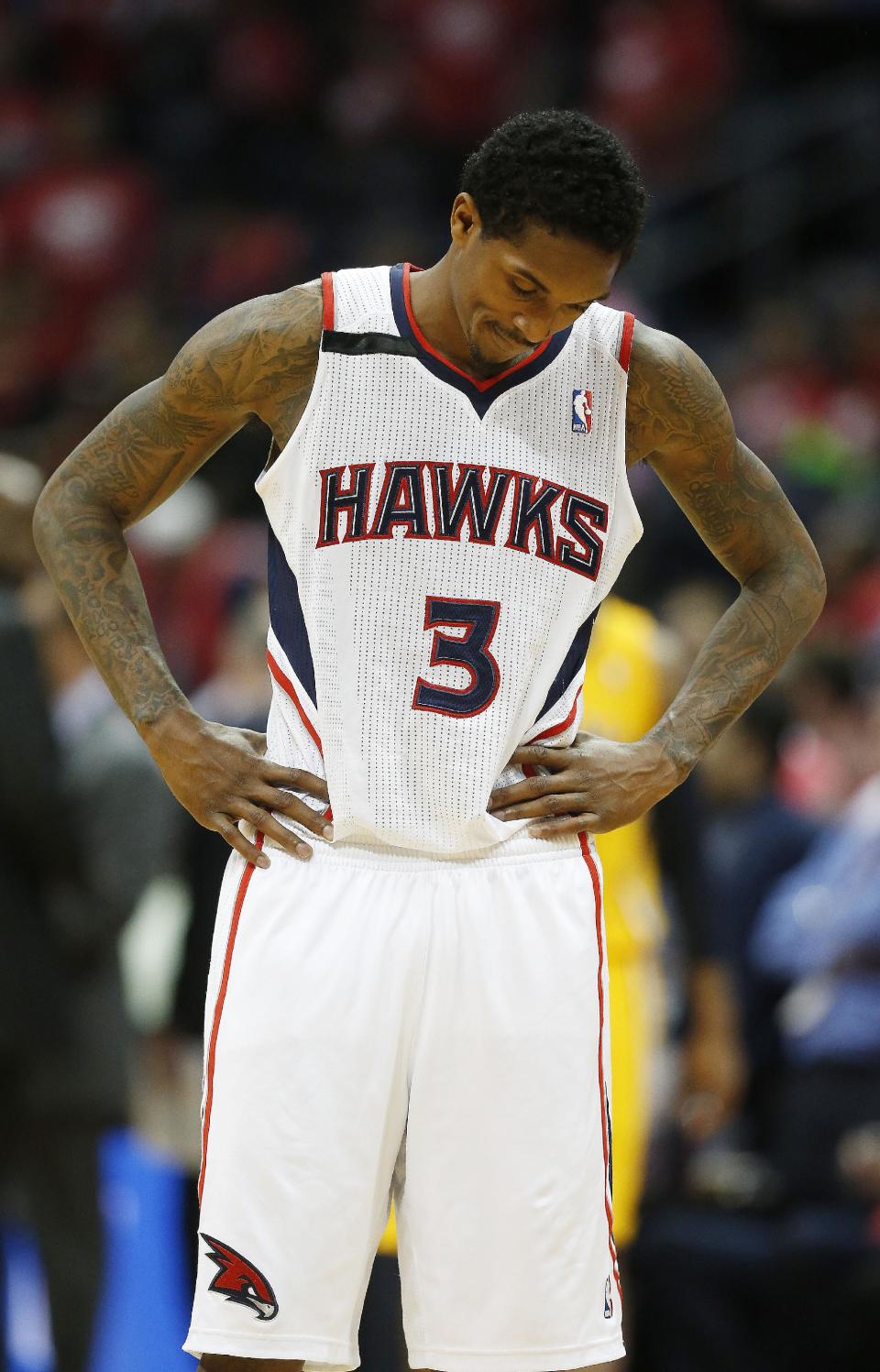 Atlanta Hawks guard Louis Williams (3) looks down during a timeout late in the second half of Game 6 of a first-round NBA basketball playoff series against the Indiana Pacersin Atlanta, Thursday, May 1, 2014. Indiana won 95-88. (AP Photo/John Bazemore)