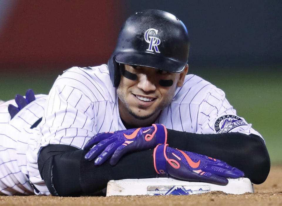 Carlos Gonzalez on Friday agreed to return to the Colorado Rockies on a one-year, $8 million contract. (AP)