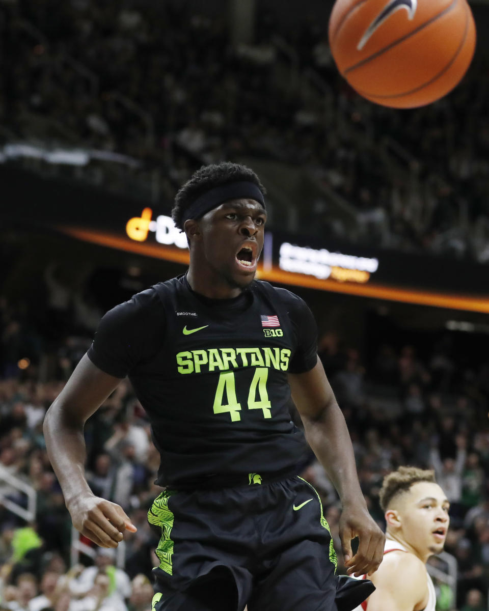 Michigan State forward Gabe Brown reacts after a dunk during the second half of an NCAA college basketball game against Wisconsin, Friday, Jan. 17, 2020, in East Lansing, Mich. (AP Photo/Carlos Osorio)