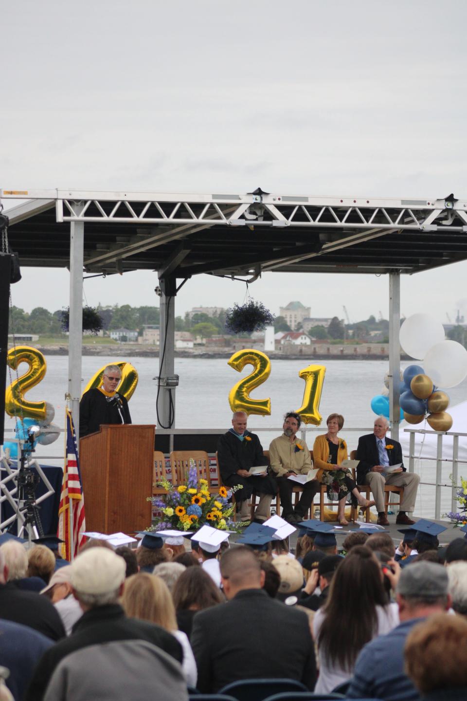 R.W. Traip Academy principal John Drisko is seen here delivering a graduation speech at Fort Foster in June 2021. Drisko announced last month that he will be retiring at the end of the school year after serving five years in the position.