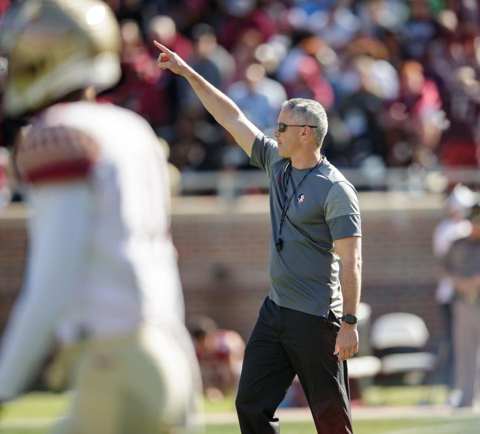 Florida State Seminoles head coach Mike Norvell conducts warm-ups in Doak Campbell Stadium before the Garnet and Gold spring game kickoff Saturday, April 9, 2022.<br>Fsu Spring Game137