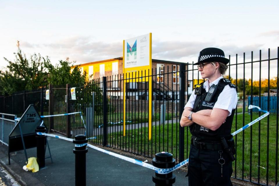 A police officer outside the nearby Montbelle primary school (Lucy Young)