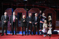 Washington Capitals center Nicklas Backstrom waves the the crowd at a ceremony to honor him for recording his 1,000th NHL point before an NHL hockey game against the New Jersey Devils, Saturday, March 26, 2022, in Washington. (AP Photo/Nick Wass)