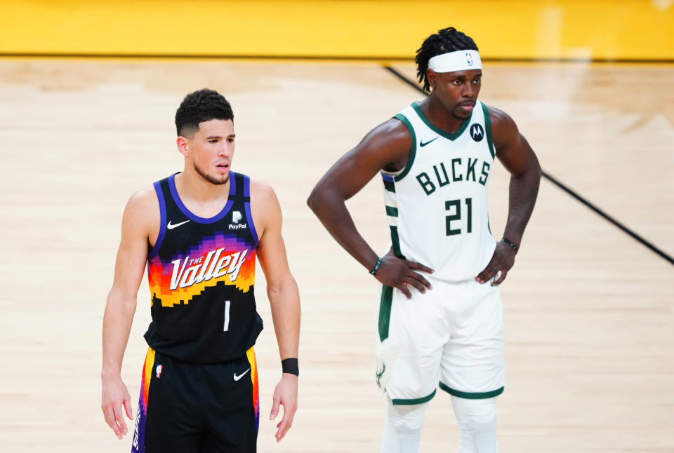 The amount of behind-the-scenes work Suns guard Devin Booker and Bucks counterpart Jrue Holiday invested in reaching the 2021 NBA Finals is overlooked. (Mark J. Rebilas/USA Today Sports)