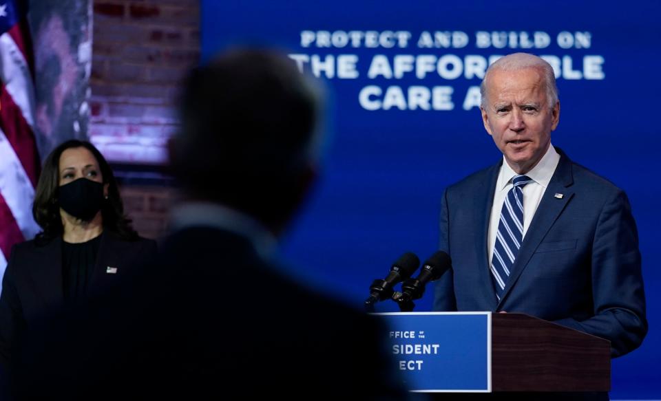 President-elect Joe Biden, joined by Vice President-elect Kamala Harris, answers a reporter's question at The Queen theater on Tuesday in Wilmington, Delaware.