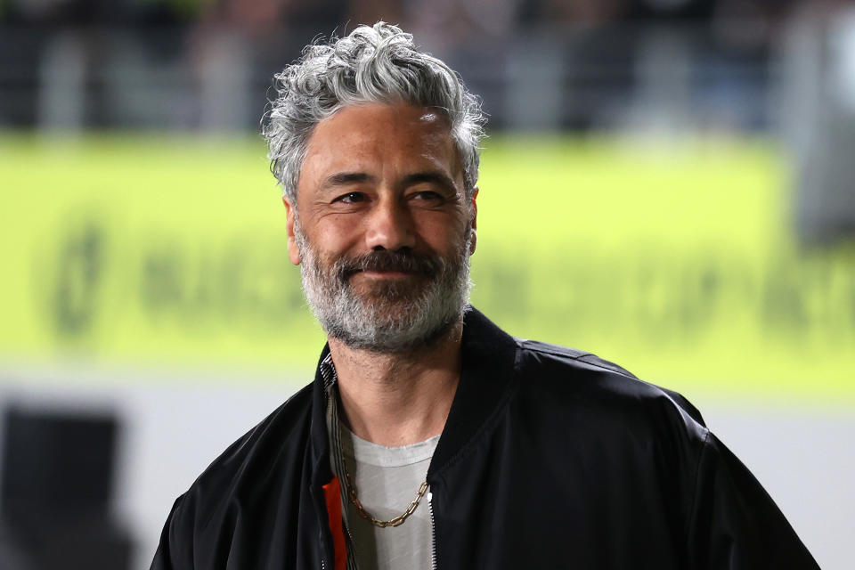 AUCKLAND, NEW ZEALAND - OCTOBER 08: Taika Waititi​ looks on during the Pool A Rugby World Cup 2021 New Zealand match between Australia and New Zealand at Eden Park on October 08, 2022, in Auckland, New Zealand. (Photo by Fiona Goodall - World Rugby/World Rugby via Getty Images)