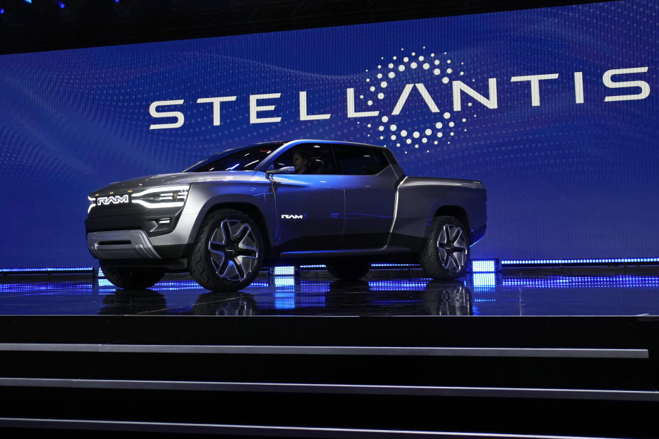 The Ram 1500 Revolution electric battery powered pickup truck is displayed on stage during the Stellantis keynote at the CES tech show Thursday, Jan. 5, 2023, in Las Vegas. (AP Photo/John Locher)