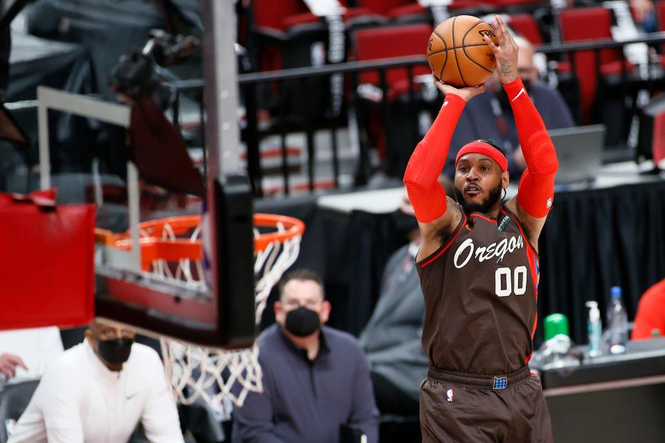 Carmelo Anthony #00 of the Portland Trail Blazers shoots against the Denver Nuggets in the second quarter during Round 1, Game 6 of the 2021 NBA Playoffs at Moda Center on June 03, 2021 in Portland, Oregon.