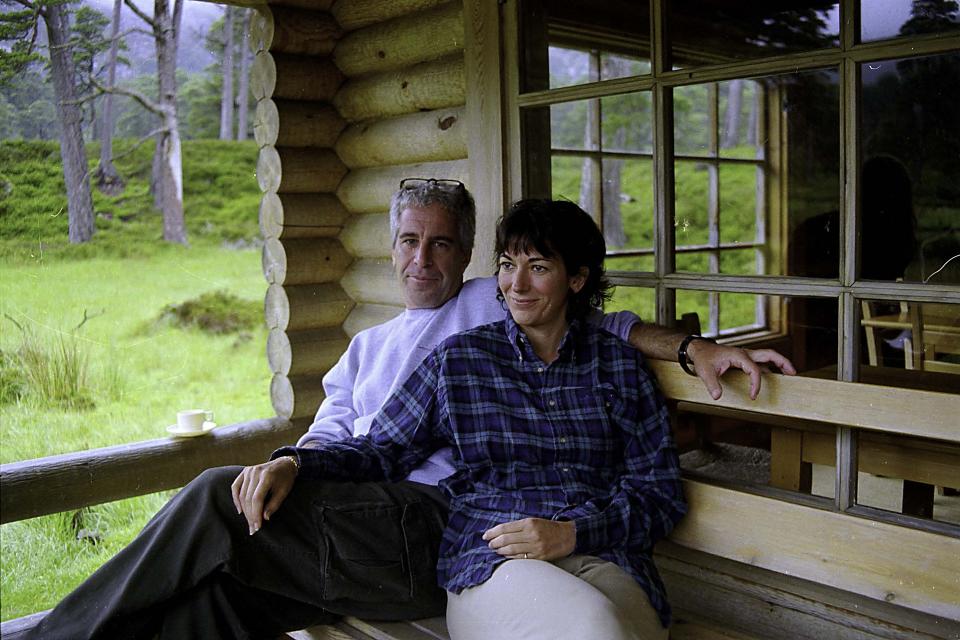 This undated file photo of Jeffrey Epstein and Ghislaine Maxwell at the Queen's log cabin at Glen Beg, Balmoral, Scotland, was recovered during an FBI raid at Epstein's Upper East Side mansion in 2019 and entered into evidence on Dec. 7, 2021.