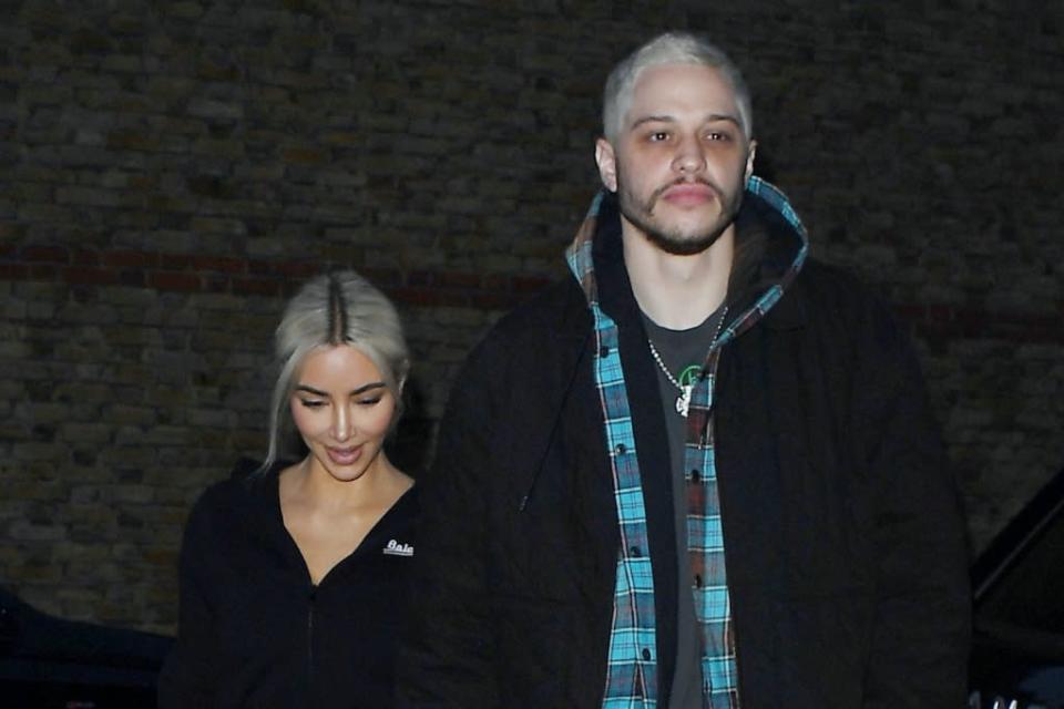 Kim Kardashian Gets Sleek in London With Pete Davidson in Cropped Hoodie & High-Rise Boot Pants for Date Night - Yahoo Life