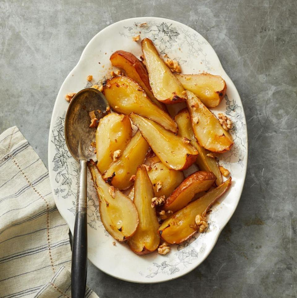 <p>Sweet and savory come together beautifully in this side dish. A pinch of pepper adds a kick of heat and toasted walnuts offer a satisfying crunch.</p><p><em><a href="https://www.goodhousekeeping.com/food-recipes/a37885956/roasted-pears-recipe/" rel="nofollow noopener" target="_blank" data-ylk="slk:Get the recipe for Roasted Pears »;elm:context_link;itc:0;sec:content-canvas" class="link ">Get the recipe for Roasted Pears »</a></em> </p>