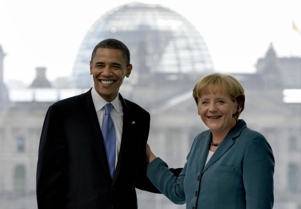 Merkel welcomes Obama during his run for president, on July 24, 2008, in Berlin.